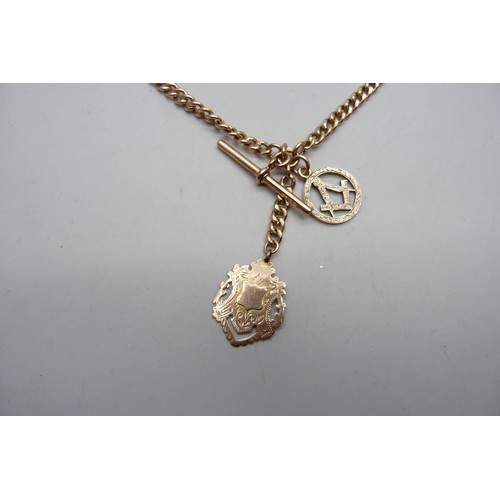 9003 - A 9ct yellow gold Albert chain with Masonic fob, 35.5g