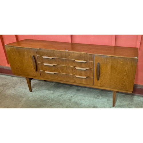 6 - A teak sideboard