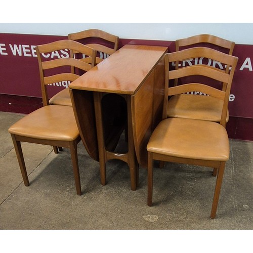 10 - A Nathan teak drop leaf table and four chairs