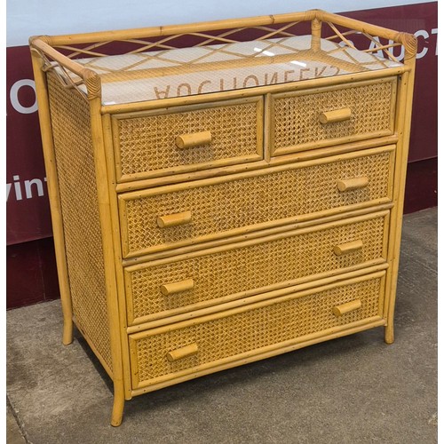 27 - An Italian style bamboo and rattan chest of drawers