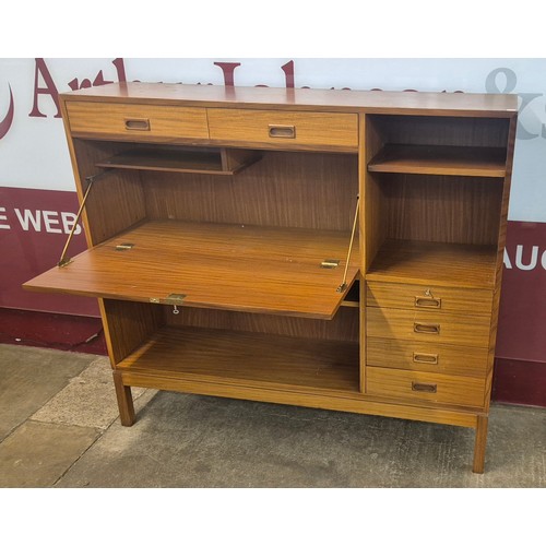 31 - A Danish teak writing cabinet/bookcase