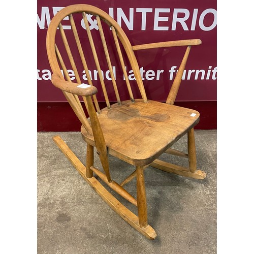 62 - An Ercol Blonde elm and beech Windsor rocking chair