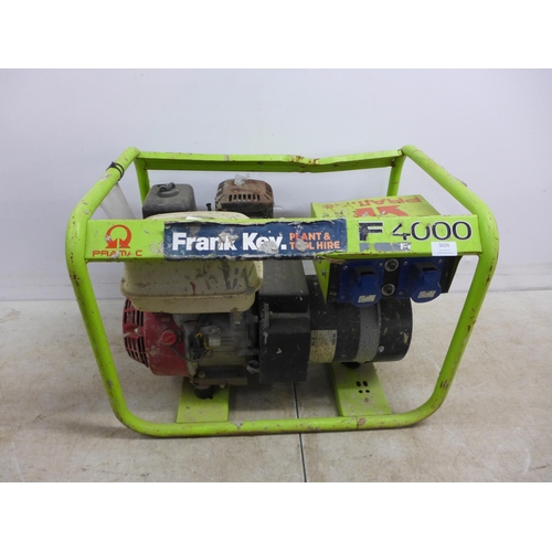 5026 - A Pramac E4000 230V/110V portable petrol driven generator with a Honda GX200 petrol engine