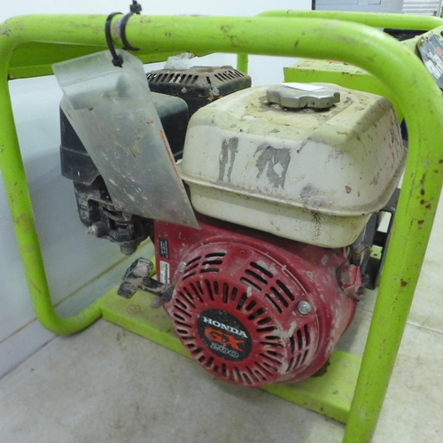 5026 - A Pramac E4000 230V/110V portable petrol driven generator with a Honda GX200 petrol engine