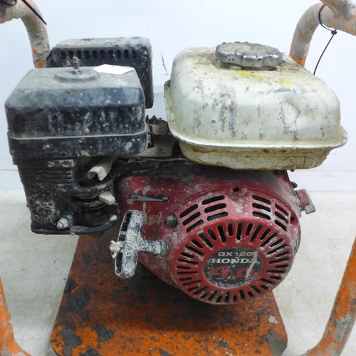 5021 - A Belle 4HP petrol driven poker power unit with a Honda GX120 4.0 petrol engine