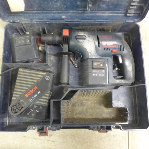 5040 - 3 power tools including a Makita 9005B, 110V angle grinder, a Bosch PSB 24 VE-2 cordless drill with ... 