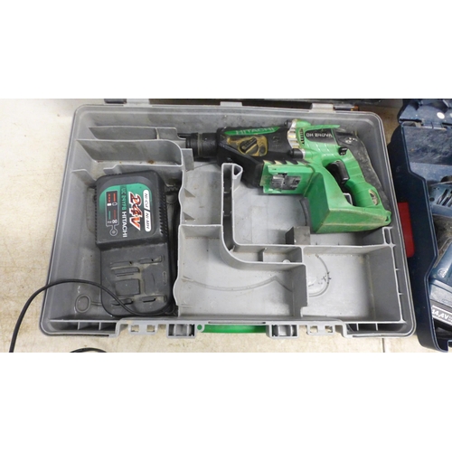 5042 - 3 power tools including a Metabo 110V angle grinder, a Hitachi DH 24DVA, 24V hammer drill with 24V b... 