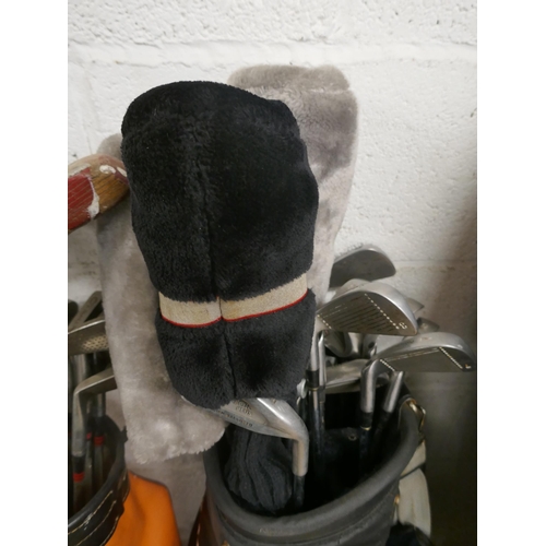 5155 - A MacGregor golf bag and a quantity of clubs including Spalding irons, Palm Springs irons, assorted ... 