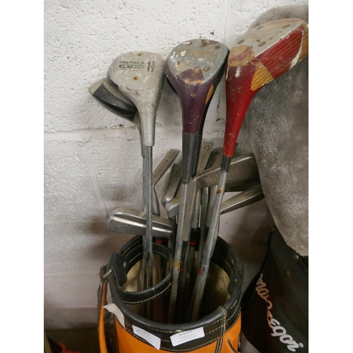 5155 - A MacGregor golf bag and a quantity of clubs including Spalding irons, Palm Springs irons, assorted ... 