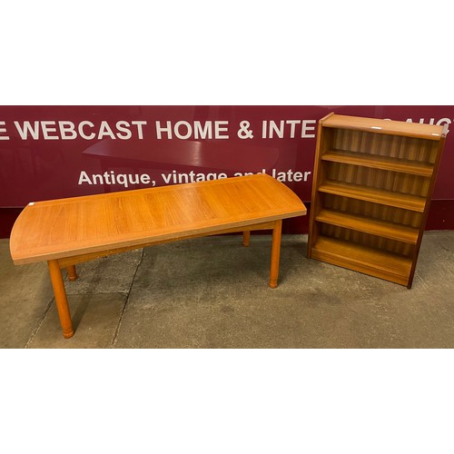 59 - A teak coffee table and a small teak open bookcase