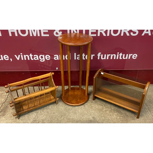 68 - Two teak magazine racks and a jardiniere stand