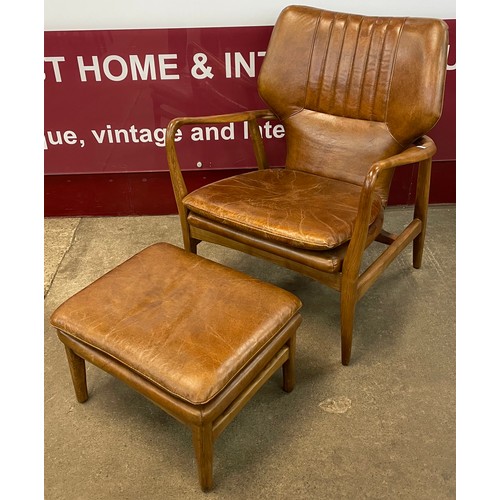 72 - A Danish style ash and chestnut leather armchair and footstool