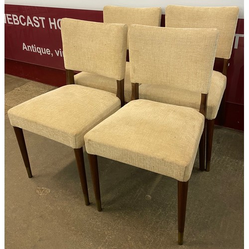 74 - A set of four teak and cream fabric dining chairs