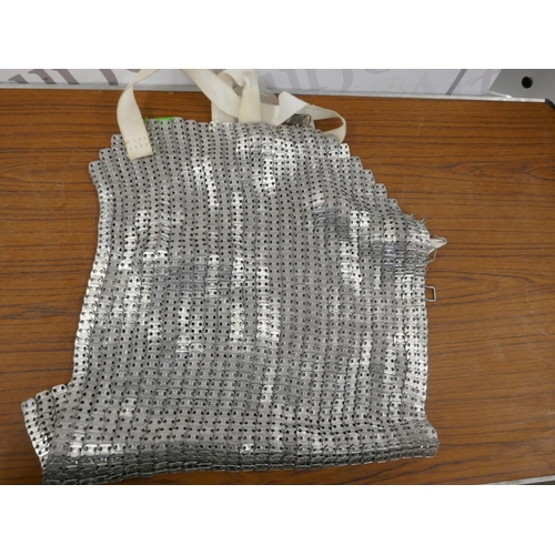 5216 - A tool roll of brace bits and a chain mail apron