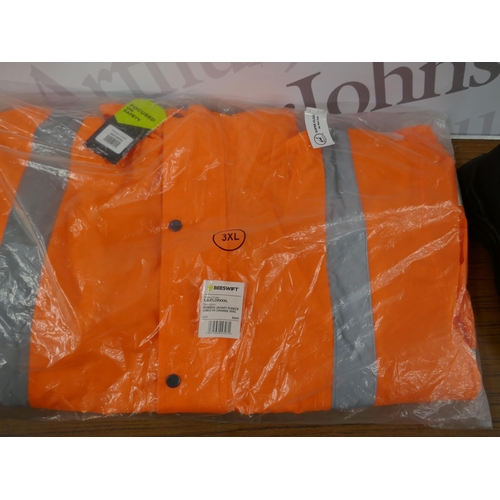 5224 - A pair of Portwest steel toe cap work boots, size 11, a pair of work trousers, XXL and a Beeswift hi... 