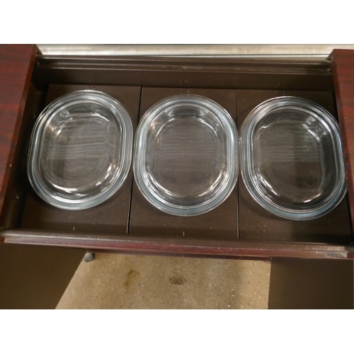 5226 - A Hostess catering trolley with 3 oval Pyrex dishes and 3 rectangular Pyrex dishes - all with lids