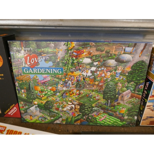 5227 - A large quantity of jigsaw puzzles