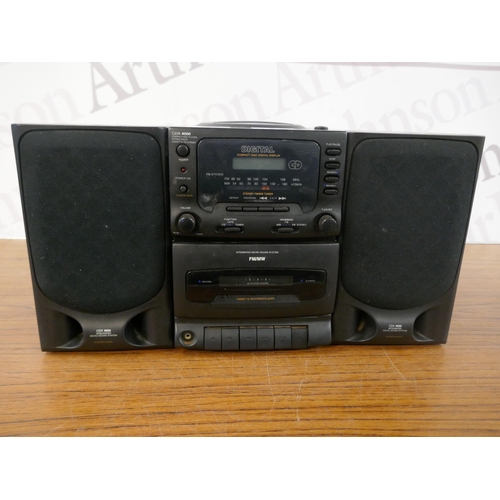 5081 - A Digital CDX4000 compact disc player, stereo radio and cassette recorder with a pair of stereo spea... 