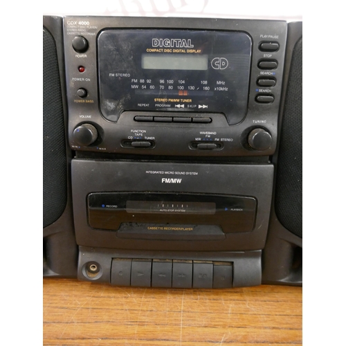 5081 - A Digital CDX4000 compact disc player, stereo radio and cassette recorder with a pair of stereo spea... 