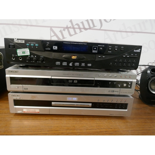 5085 - Two Sony dvd players with an Extreme Performance karaoke system and a box of assorted audio equipmen... 