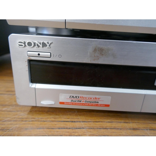 5085 - Two Sony dvd players with an Extreme Performance karaoke system and a box of assorted audio equipmen... 