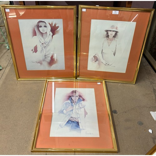 253 - A set of three Sarah Moon prints, framed