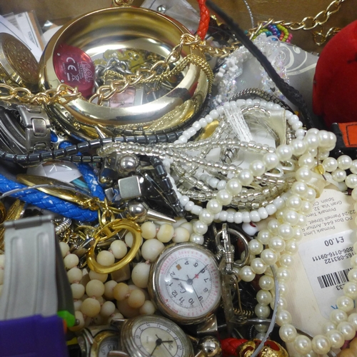 5066 - A quantity of assorted costume jewellery and wristwatches