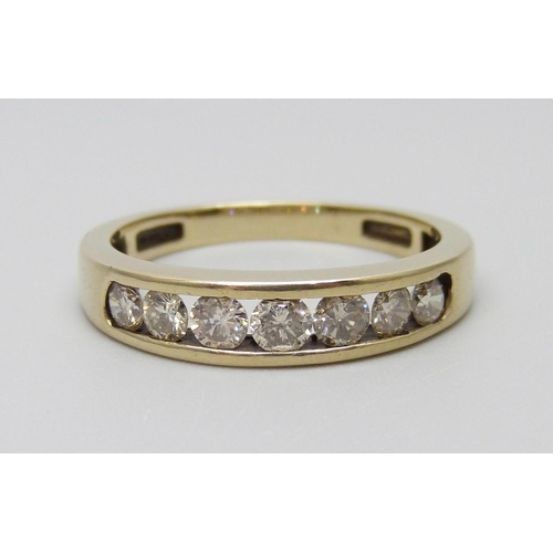 7004 - A 9ct gold seven stone diamond half-eternity ring, diamond weight 0.75 carats, stamped to band, Q, 3... 