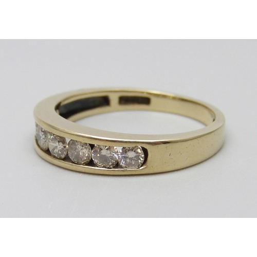 7004 - A 9ct gold seven stone diamond half-eternity ring, diamond weight 0.75 carats, stamped to band, Q, 3... 