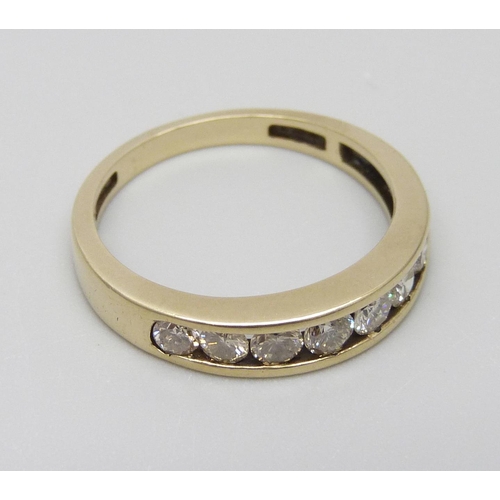 7004 - A 9ct gold seven stone diamond half-eternity ring, diamond weight 0.75 carats, stamped to band, Q, 3... 