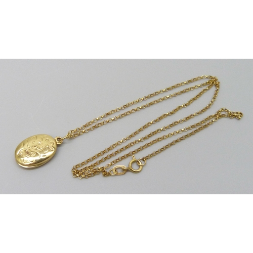 7008 - A 9ct gold locket and chain, 2.5g, chain 43cm