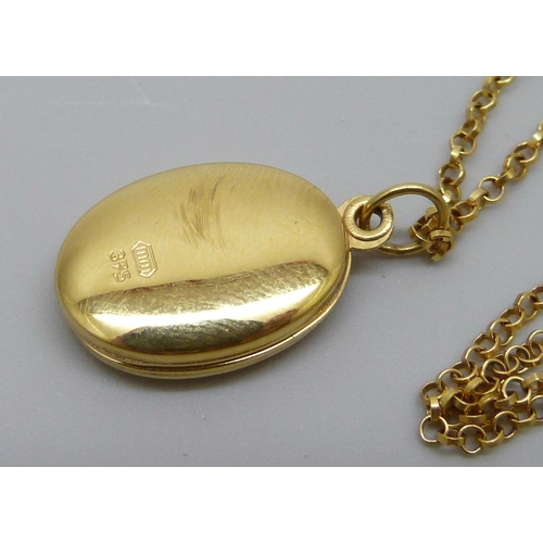 7008 - A 9ct gold locket and chain, 2.5g, chain 43cm