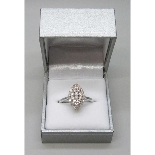 7014 - A 9ct white gold diamond cluster ring, 34 diamonds, estimated total weight 1.00ct, U, 4.2g