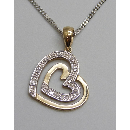 7025 - A 9ct gold and diamond set pendant on a fine 9ct white gold chain, 5.2g, chain 50cm