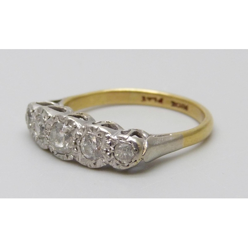 7028 - An 18ct gold, platinum set five stone diamond ring, 3.5g, L/M