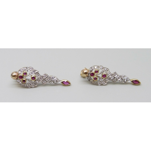 7034 - A pair of 9ct gold, ruby and diamond drop earrings, 2.8g, boxed