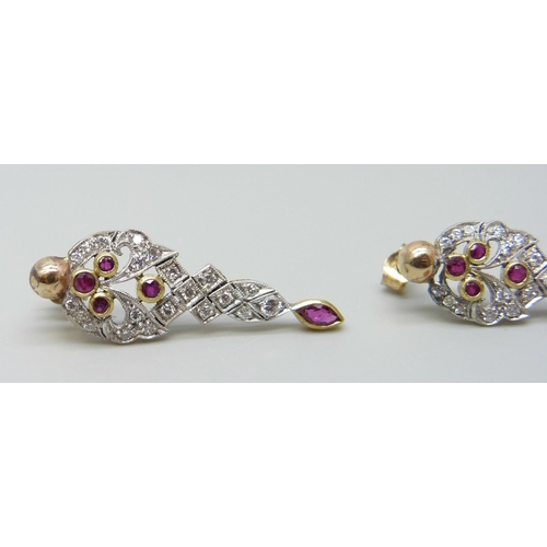 7034 - A pair of 9ct gold, ruby and diamond drop earrings, 2.8g, boxed