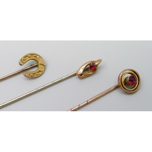 7035 - Three 9ct gold stick pins, 2.6g, one with metal pin