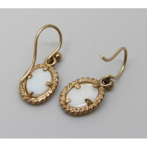 7037 - A pair of 9ct gold and opal earrings, 1.3g