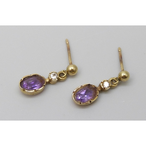 7039 - A pair of 9ct gold and amethyst earrings, 1g