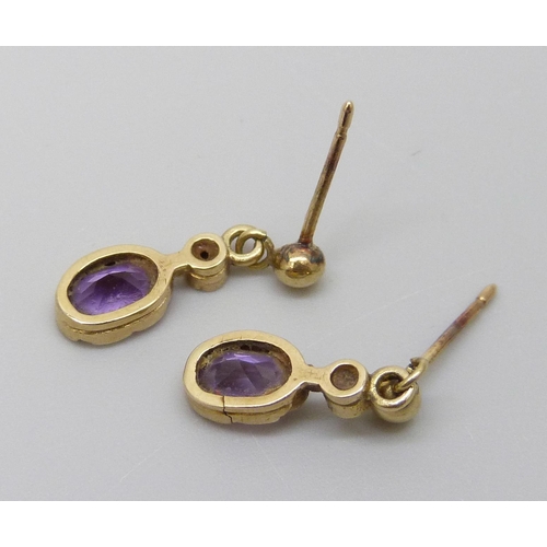 7039 - A pair of 9ct gold and amethyst earrings, 1g