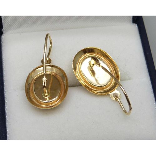 7043 - A pair of 9ct gold cameo earrings, a pair of 9ct gold cross earrings, two 9ct gold single earrings a... 