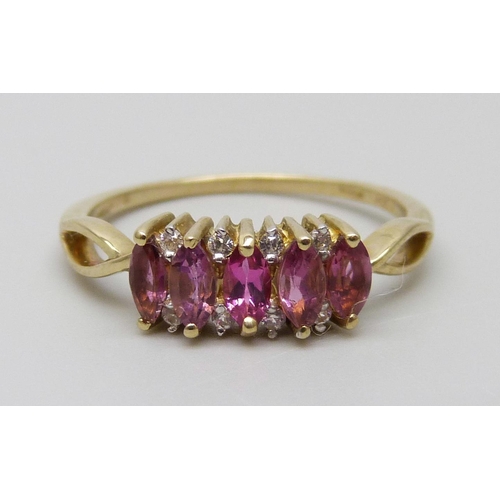 7044 - A 9ct gold, diamond and pink stone ring, 1.9g, Q