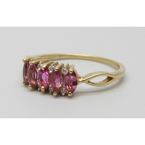 7044 - A 9ct gold, diamond and pink stone ring, 1.9g, Q