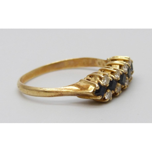 7056 - A yellow metal, sapphire and diamond ring, 2.6g, M