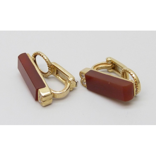 7065 - A pair of 14ct gold, diamond and carnelian clip-on earrings, marked 585 and LD, 6.7g, 17mm