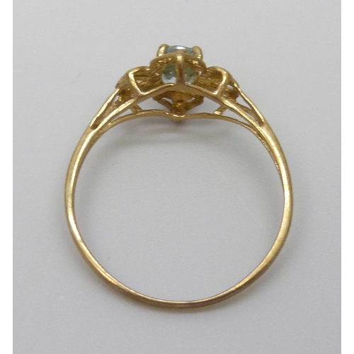 7080 - A 9ct gold and blue stone ring, 1.0g, O