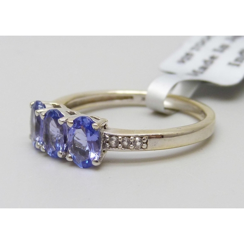 7105 - A silver gilt tanzanite and topaz ring, P