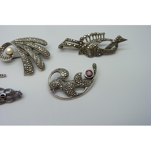 7107 - Five silver and marcasite brooches