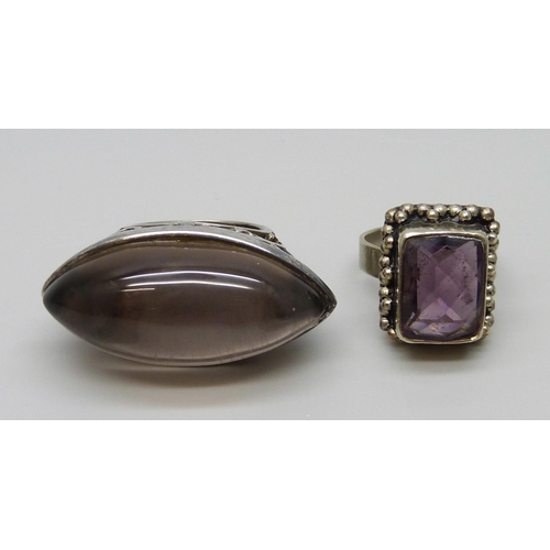 7112 - A large hallmarked silver ring and one other ring, both size N